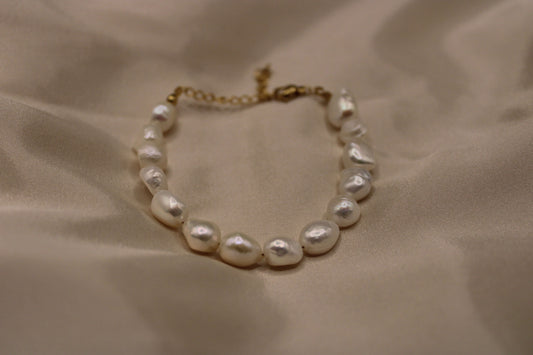 Handgemaakte armband van parels 9mm.