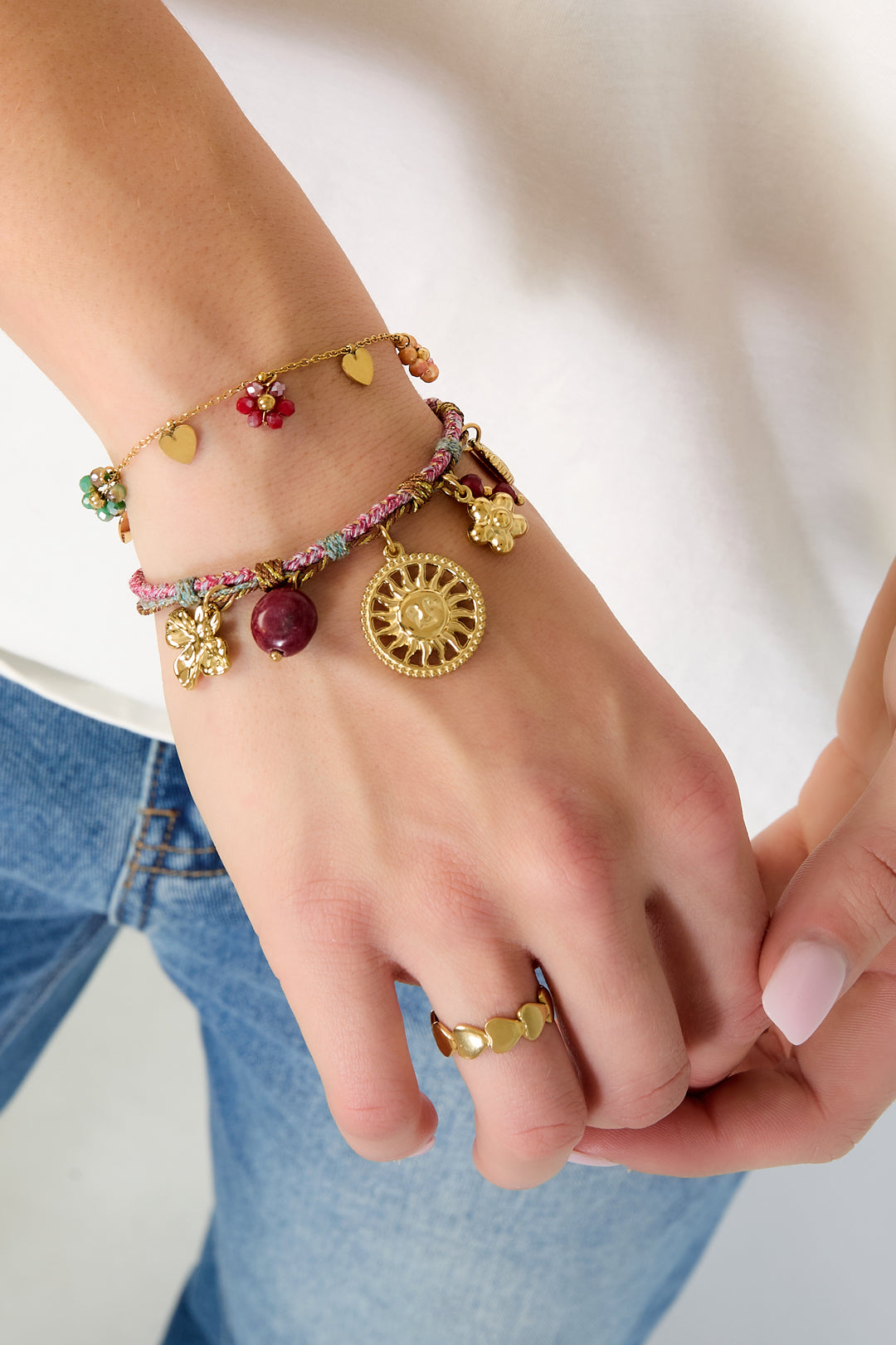 Bedelarmband met bloem, zon & hart