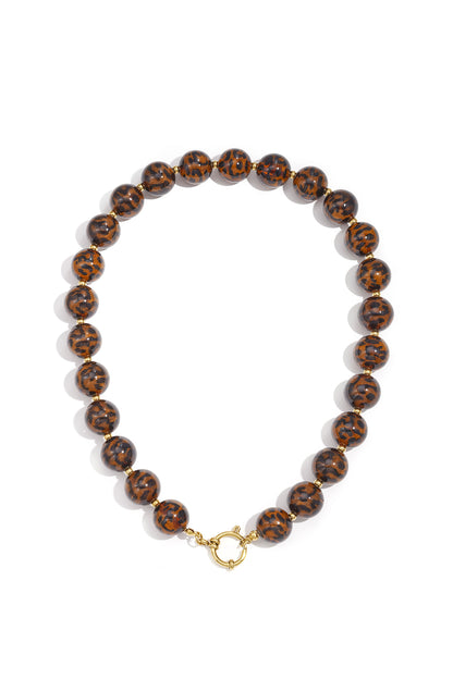 Ketting met grote kralen – retro panterprint, acryl kralen met panterprint en goudkleurige details