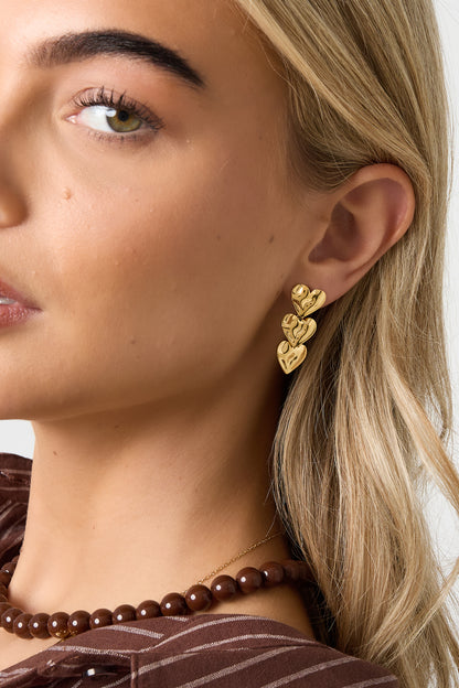 Oorbellen met hartjes en casual details