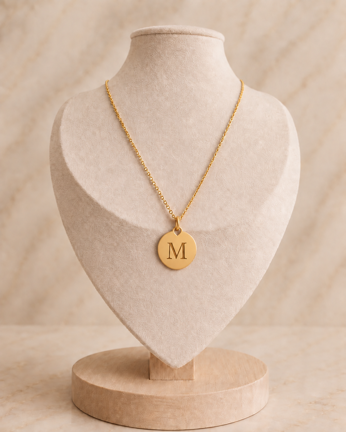 Goudkleurige RVS ankerketting met ronde letterbedel